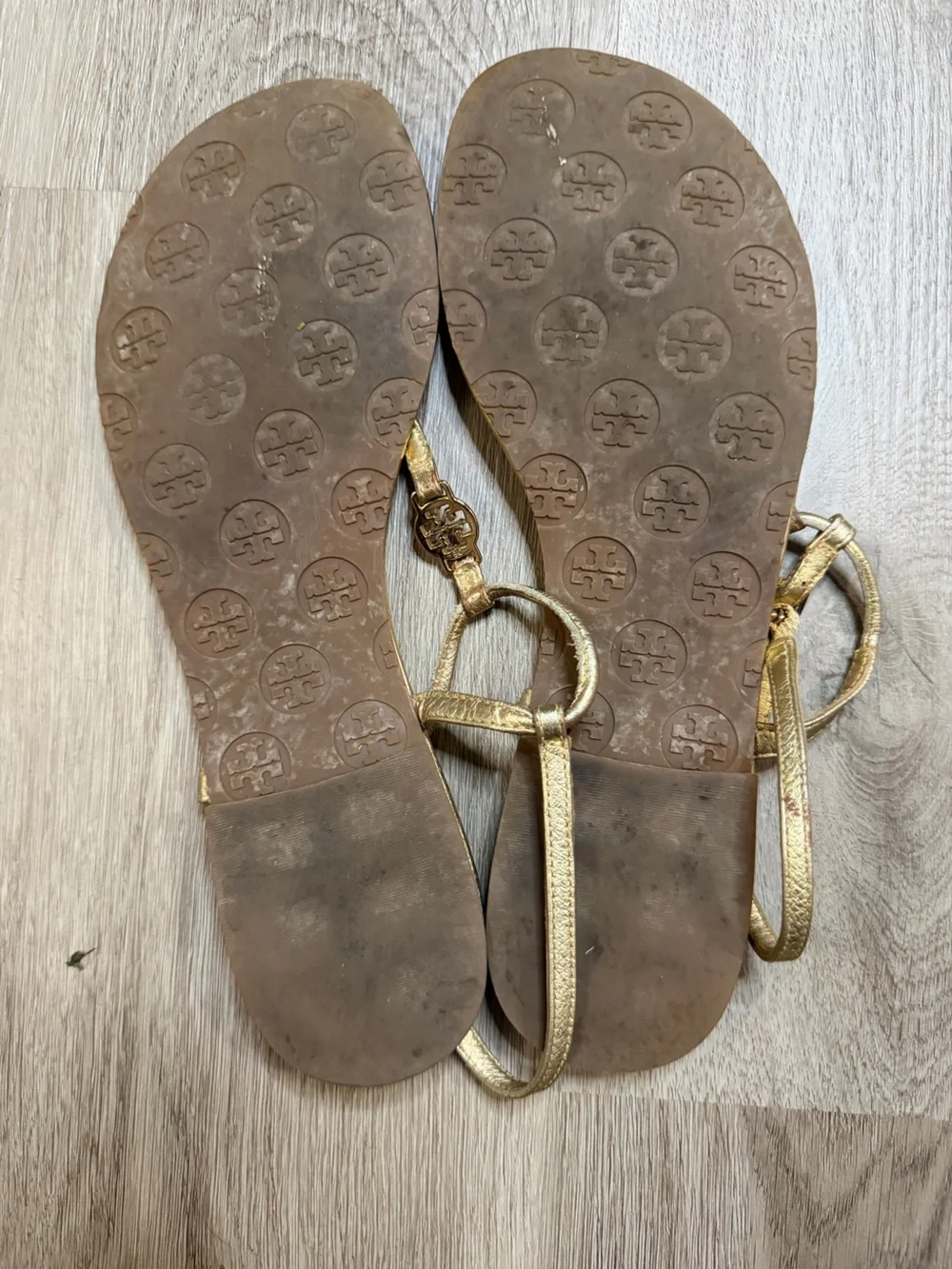 Tory Burch Metallic Gold Leather Thong Sandals with Logo Charm